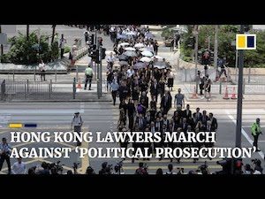 Hong Kong lawyers march against ‘political prosecution’