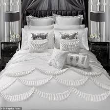 Kylie Minogue's homeware brand loses its two-year legal battle against Caprice Bourret after accusing her company of copying bed linen designs
