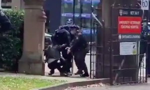 Sydney university professor who teaches law of protest arrested at student protest