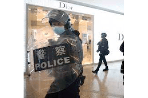 National security law: Hong Kong woman stands trial accused of targeting police by dropping metal post from height at Times Square shopping centre