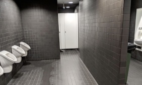 Australia: Sydney Law School Library Toilets Are "a black-tiled abyss devoid of natural light"