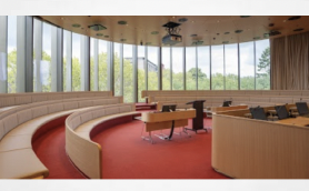 Australia: New Macquarie University building, named for the Honourable Dr Michael Kirby AC CMG, features a “floating” moot court, teaching spaces, lecture theatres, recording spaces, and independent and collaborative study and research spaces.