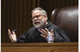 NPR: Kansas Supreme Court sides with Leawood woman who lost job offer after she refused COVID vaccine