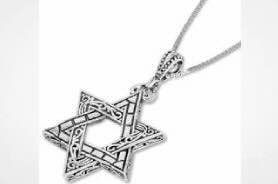 UK: Jewish lawyer is questioned by police over wearing a Star of David necklace that 'antagonised' pro-Palestinian protesters during demo