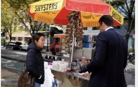 Washington lawyer on furlough lives out dream of running a hot dog cart