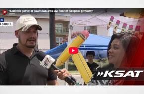 San Antonio - Texas: Hundreds gather at downtown area law firm for backpack giveaway